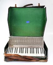 HOHNER; an early 20th century 'Verdi III' accordion in fitted case, bearing a trade label to the