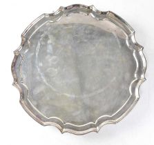 JAMES DIXON & SONS LTD; a George VI hallmarked silver shaped salver, raised on three scrolling