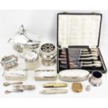 Silver and silver plated items to include four mixed silver topped dressing table glass boxes, a