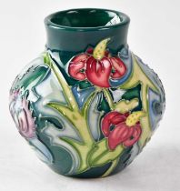 MOORCROFT; a small vase in the 'Leicester' design, copyrighted for 1995, with impressed and