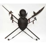 A 17th century style armorial wall-hanging display comprising a Chinese halberd, an English halberd,