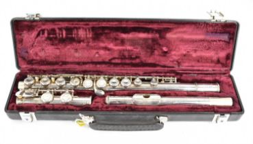 BUFFET CRAMPON; a silver plated three-piece cased flute, marked Cooperscale AKC E. Condition Report: