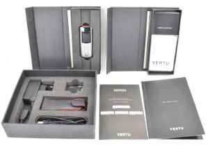 FERRARI; a Vertu Ascent Ferrari 1947 limited edition mobile phone and accessories, certificate of