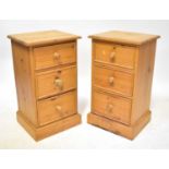 A pair of pine bedside drawers, with three drawers to plinth base, 167 x 38.5 x 33cm, a Chinese-