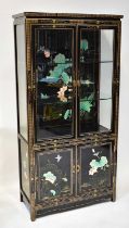 A modern Oriental-style black lacquered gilt-heightened display cabinet, with pair of bevelled glass