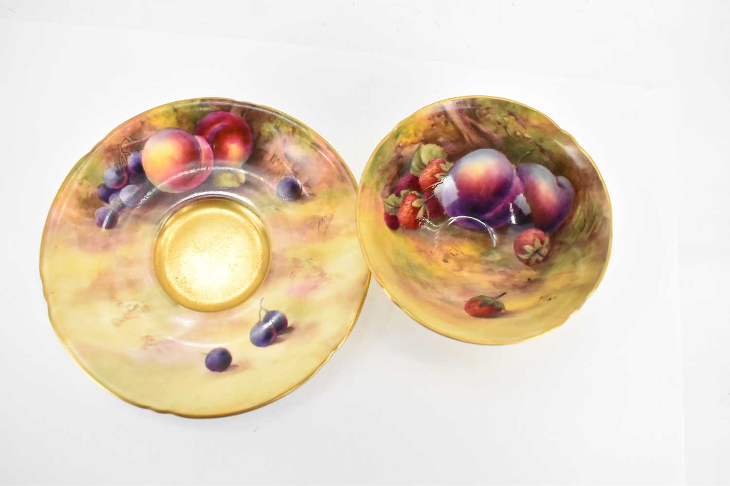 ROYAL WORCESTER; a teacup and saucer hand-painted fallen fruit, by Horace Price, factory marks to - Image 2 of 5
