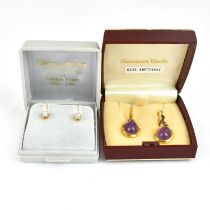 A pair of 9ct gold mounted diamond stud earrings and a pair of rolled gold earrings set with