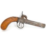 A 19th century percussion cap pocket pistol with screw-off barrel, floral decoration to the box,