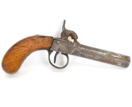 A 19th century percussion cap pocket pistol with screw-off barrel, floral decoration to the box,