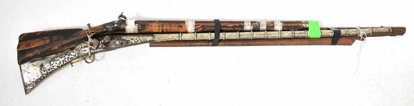 Four muzzle loading long guns, all requiring substantial restoration. Condition Report: - Please