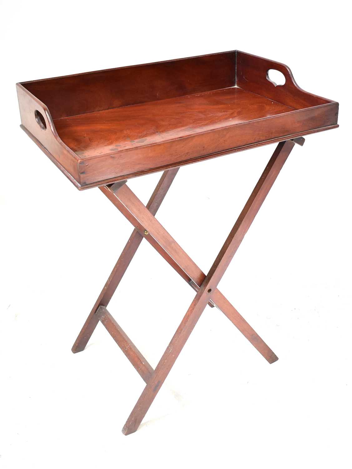 A 19th century mahogany butler's tray on folding stand, 99 x 75 x 49cm. Condition Report: Top has