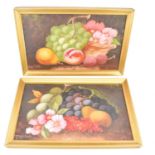 T WILSON (Lake District, 19th century); a pair of oil on board, fallen fruit, signed lower left,