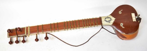 A sitar with penwork bone inlay, length 111cm.
