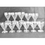 Two sets of similar shaped rummer glasses, with cone-shaped bowls with moulded fluted bottoms,