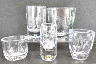 Five clear lead crystal Scandinavian vases to include Stromberg's Hyttan Sweden, engraved with image