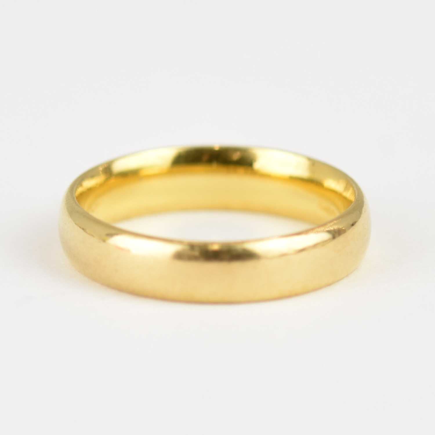 A 22ct gold wedding band, size K, approx. 4.2g.