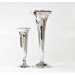 A hallmarked silver trumpet vase, height 23.2cm and a smaller example, height 16.3cm, both with