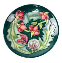 MOORCROFT; a pin dish in the 'Leicester' design, copyrighted for 1995, with impressed and painted