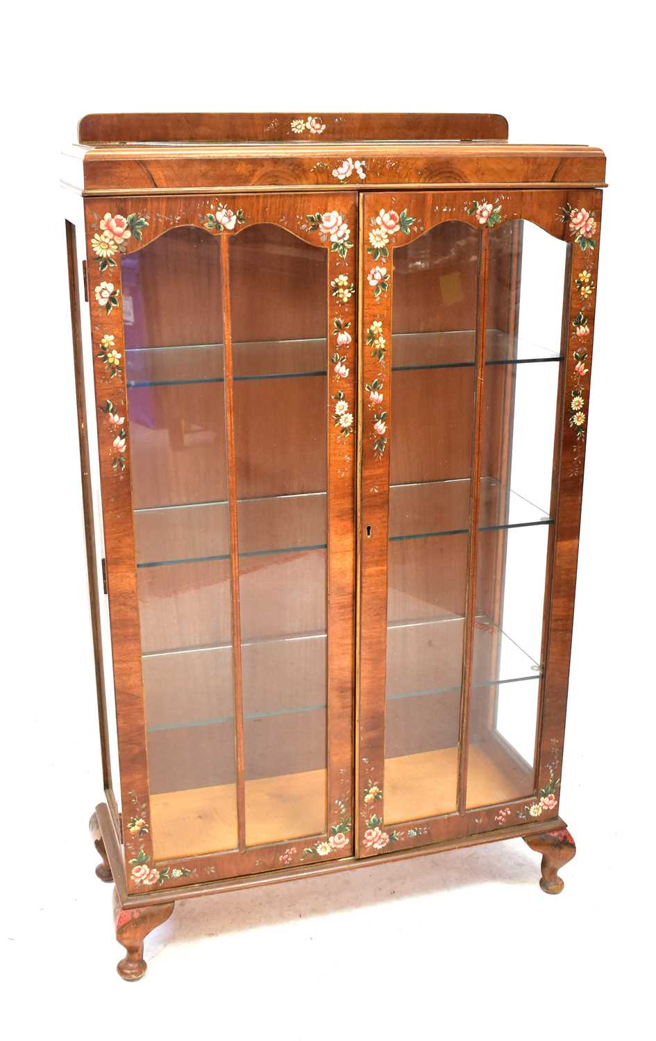 A vintage mahogany two-door display cabinet with three glass inner shelves, glazed sides and