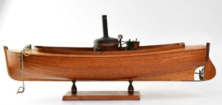 A handmade scratch-built working model of a steamboat, made of varnished wood and fitted with a