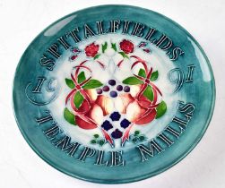 MOORCROFT; a commemorative plate inscribed 'Spitalfields Temple Mills 1991', with impressed and