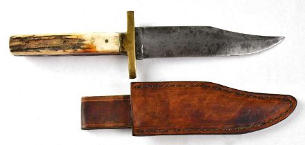 A Victorian antler-handled Bowie knife with brass cross guard,14cm unmarked blade and leather sheath