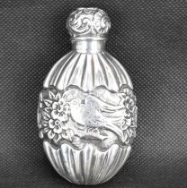 A late 19th/early 20th century hallmarked silver perfume bottle of ovoid form with central band
