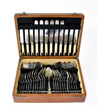 A six-setting canteen of silver plated cutlery, the knives marked 'Kenwrights', within oak canteen.