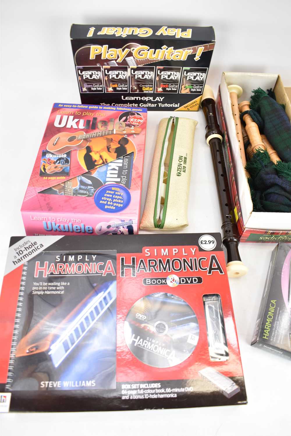 A mixed lot of mainly beginner's musical instruments, etc, comprising boxed junior bagpipes, a boxed - Image 3 of 3