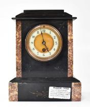 An early 20th century thirty-hour black slate and marble mantel clock, the white enamelled dial