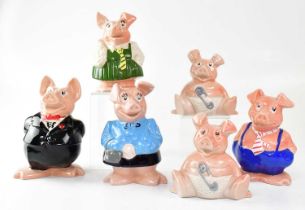 A Wade NatWest piggy bank set, with one extra piggy bank.