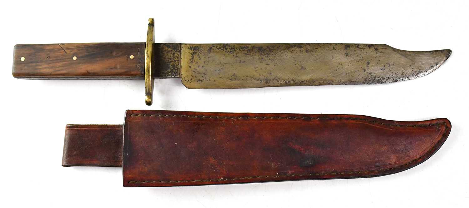 A 19th century Bowie knife with 24.5cm blade, later associated brass cross guard, wooden handle
