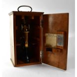 E. LEITZ WETZLAR; a cased lacquered brass monocular L.M.I microscope, in original case, 33 x 19.5