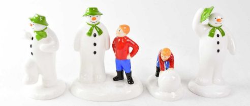 THE SNOWMAN; four Coalport Characters figures, comprising 'The Greeting', 'Building The Snowman', '