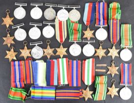 Various WWII medals and ribbons with many duplicates, comprising seven War Medals, seven Defence