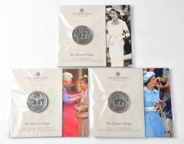 THE ROYAL MINT; three 'The Queen's Reign 2022 UK £5 Brilliant Uncirculated Coins', comprising '