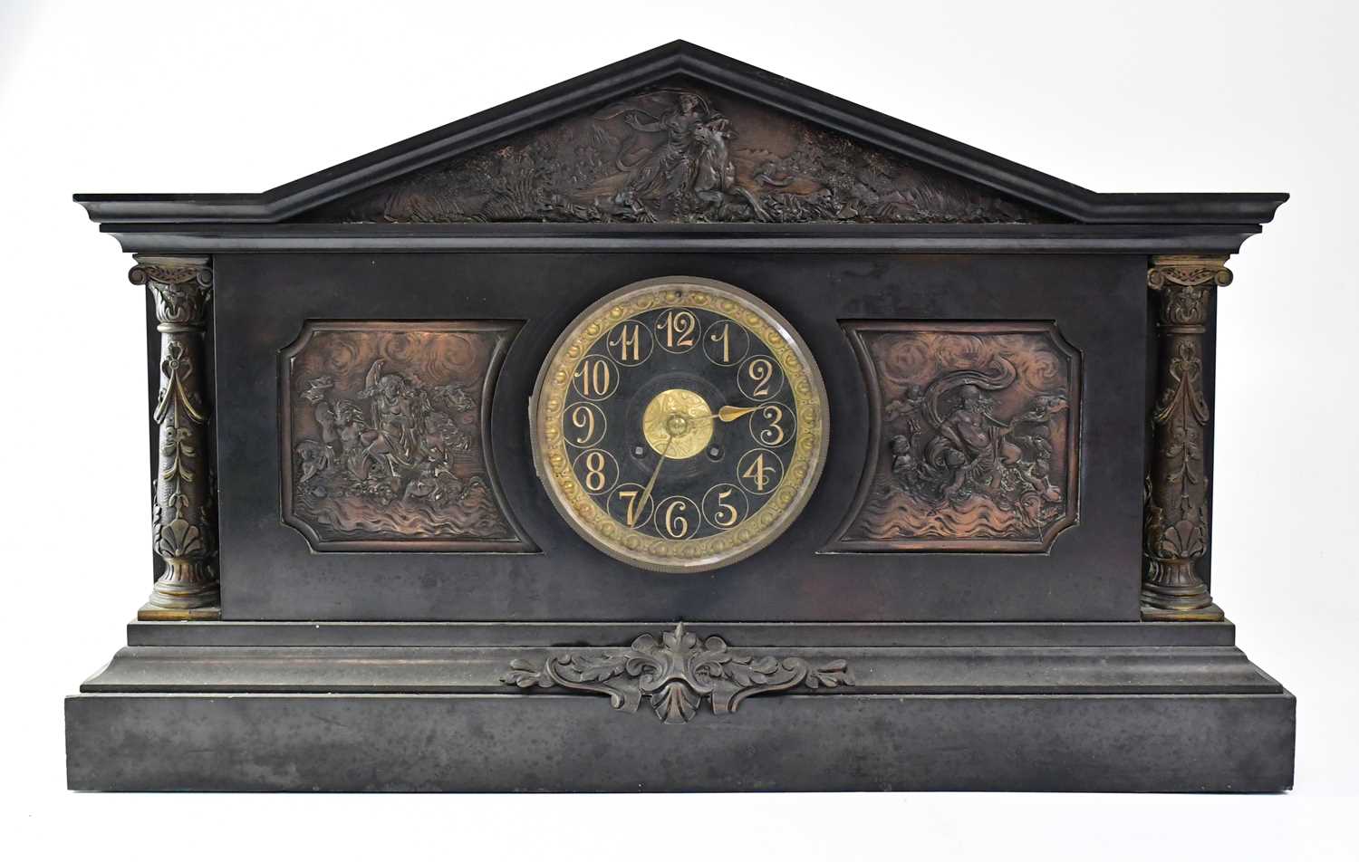 A Victorian slate mausoleum eight-day mantel clock with bronze-effect panels depicting Classical
