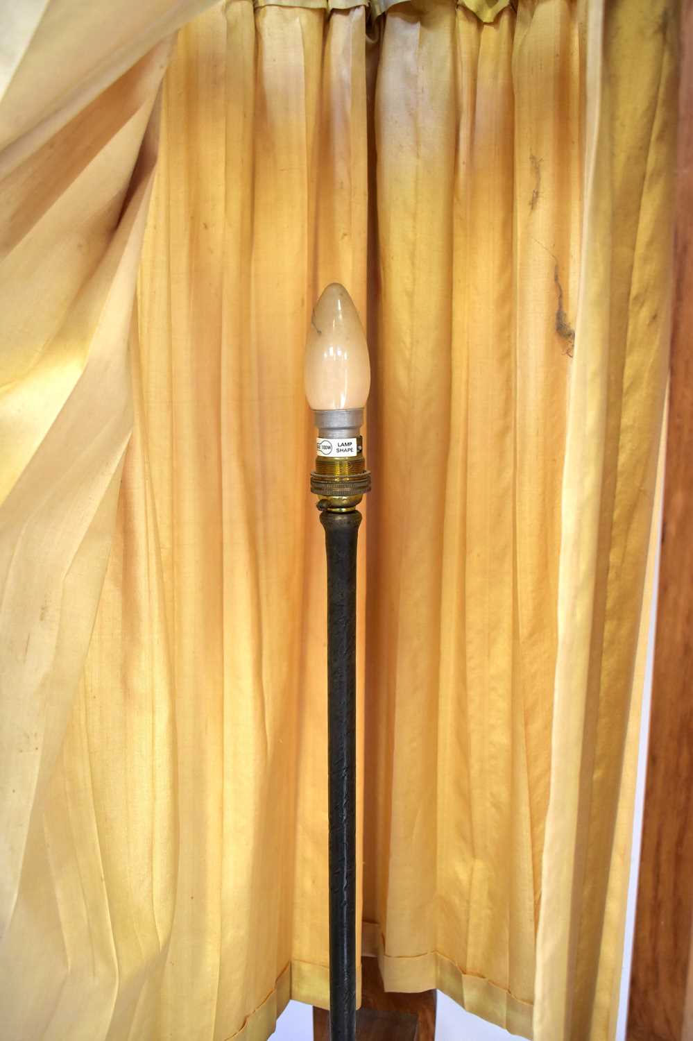 A pair of oak Arts and Crafts style standard lamps, each with three carved supports and cream drapes - Image 2 of 2