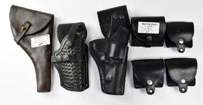 Three leather pistol holsters, one stamped to the reverse 'P221 Mod 10 12/93', together with three