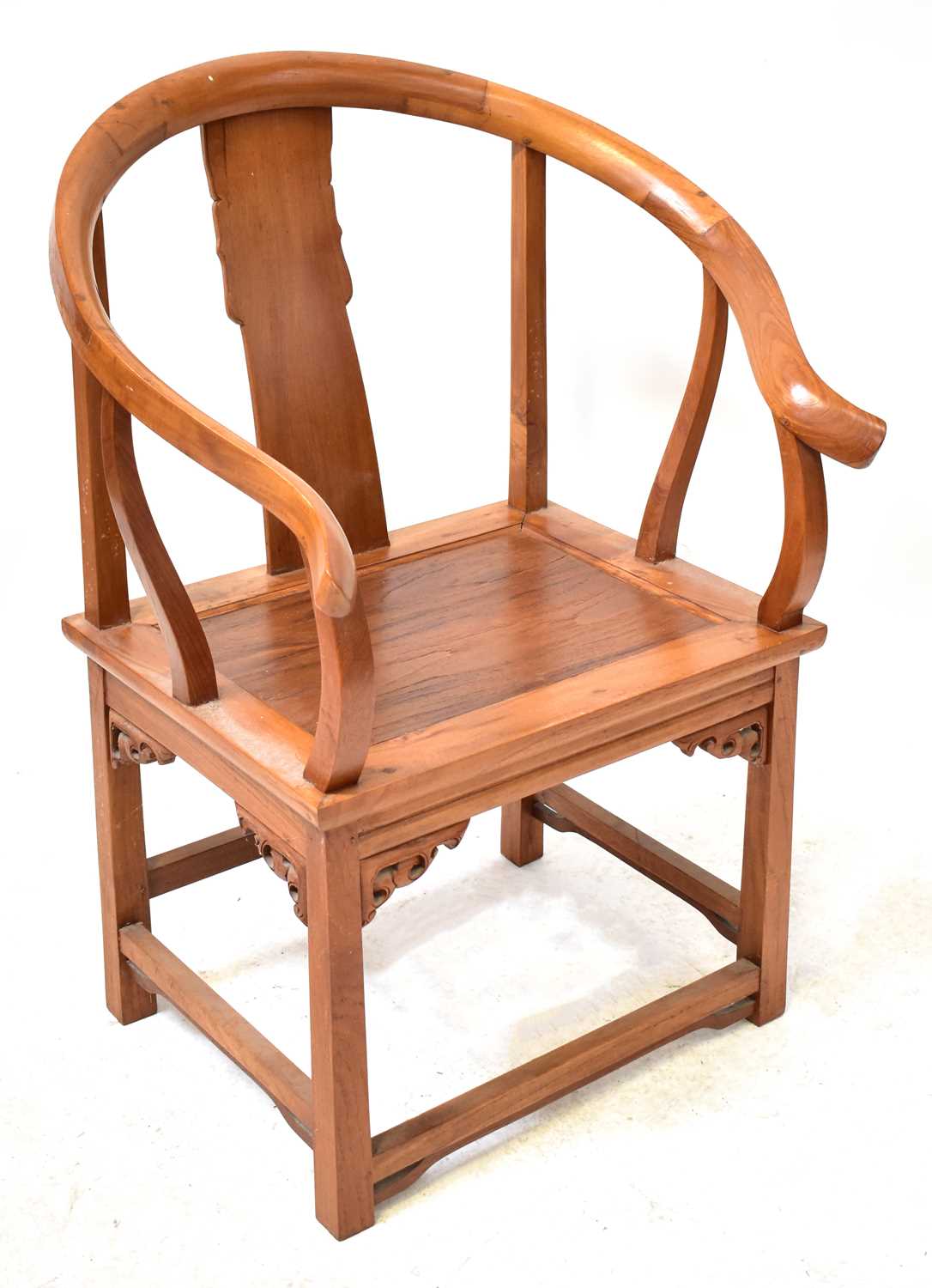 A modern Chinese hardwood horseshoe back chair, height 103cm. Condition Report: From the estate of