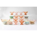 Six Royal Winton porcelain lustre sundae dishes moulded in the form of lilies on their pads,