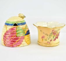 CLARICE CLIFF; a 'Fantasque Bizarre' pattern preserve pot in the form of a beehive with bee