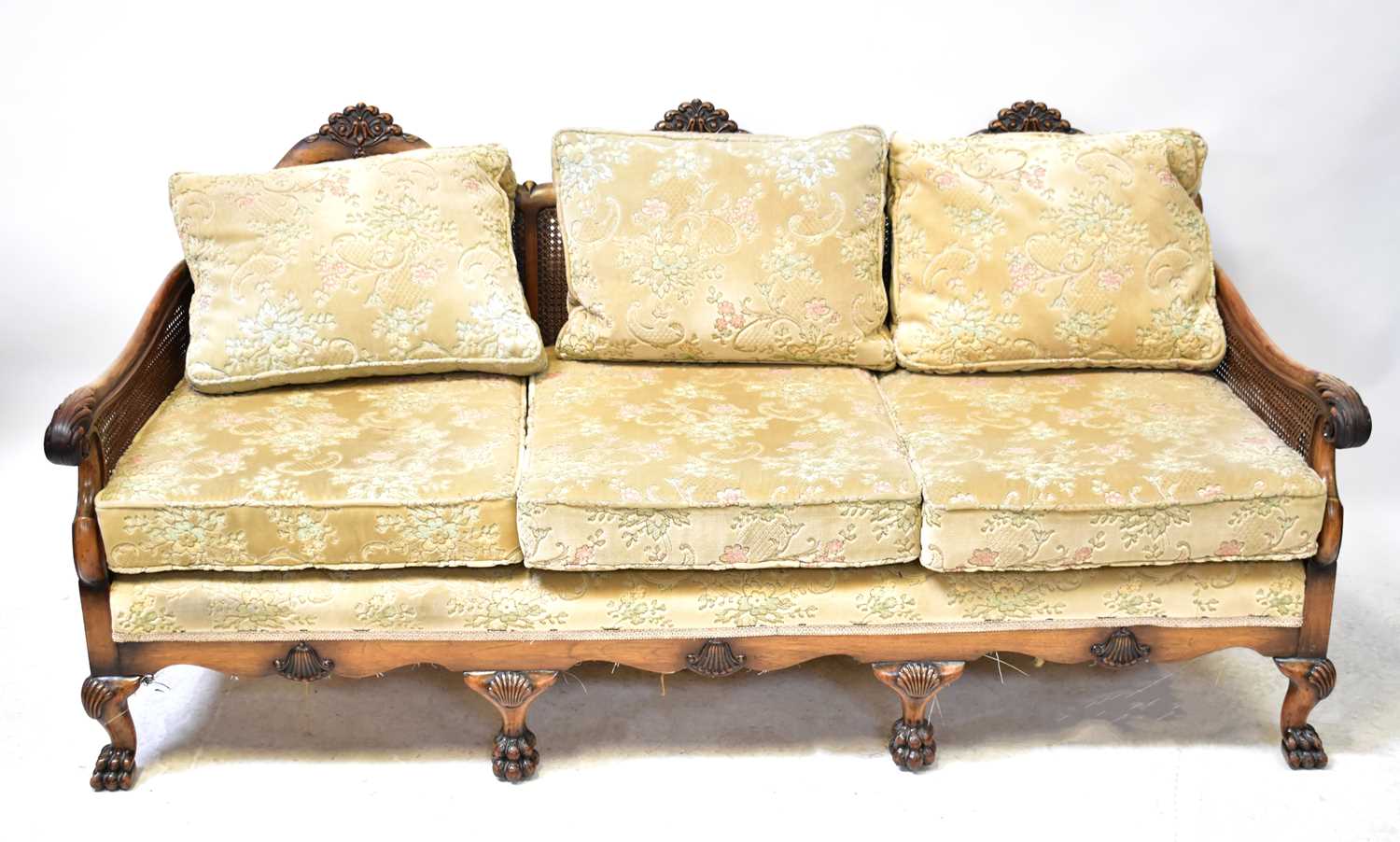 A bergère caned three-seater sofa and two armchairs (3). Condition Report: Unfortunately, all