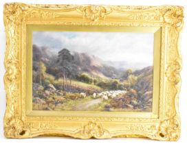 ROBERT JOHN HAMMOND (active 1879-1911); oil on canvas, a shepherd driving cattle on a mountain