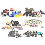 A very large quantity of remote-controlled car parts and equipment, shells, electric motors, fuel