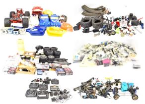 A very large quantity of remote-controlled car parts and equipment, shells, electric motors, fuel