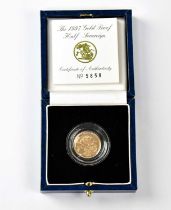 ROYAL MINT; an Elizabeth II proof half sovereign, 1997, encapsulated, boxed, with certificate of