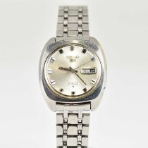 SEIKO; a model five stainless steel gentlemen's wristwatch with day/date aperture (in French), the