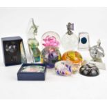 Twelve glass, acrylic and other paperweights to include a Mdina seahorse, a rabbit, bubbled with