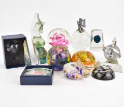 Twelve glass, acrylic and other paperweights to include a Mdina seahorse, a rabbit, bubbled with